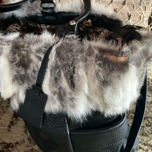 Price will reflect one piece of fur missing real rabbit hair